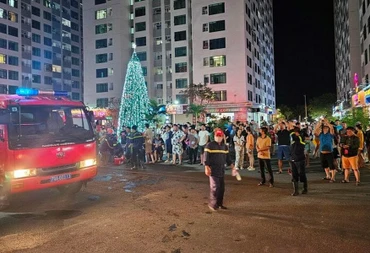 Người dân tháo chạy xuống dưới tòa nhà. (Ảnh: VTC News)