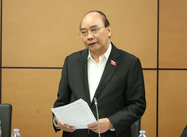 Chủ tịch nước Nguyễn Xuân Phúc góp ý kiến vào dự thảo Quy hoạch tổng thể quốc gia trong phiên thảo luận ở tổ, sáng 6/1.