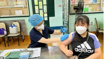 Tiêm vaccine phòng Covid-19 cho trẻ em từ 5 đến dưới 12 tuổi tại quận 5, Thành phố Hồ Chí Minh vào tháng 4/2022.