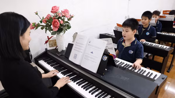 Dạy âm nhạc trong trường học. (Ảnh minh họa: ĐẠI THẮNG)