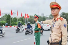 Công an Hà Nội bảo đảm trật tự an toàn giao thông tại khu vực Trung tâm hội nghị Quốc gia.