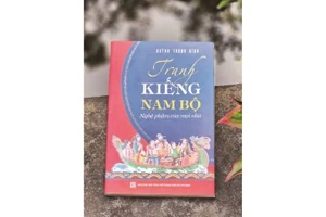 Bìa cuốn sách “Tranh kiếng Nam Bộ-Nghệ phẩm của mọi nhà” của tác giả Huỳnh Thanh Bình. (Ảnh QUỲNH MY)