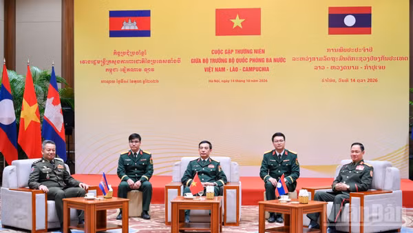 Ba Bộ trưởng Quốc phòng Việt Nam, Lào, Campuchia tại Cuộc gặp. (Ảnh: THẾ ĐẠI)