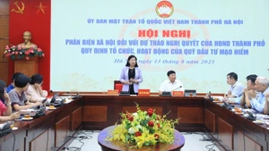 Quang cảnh hội nghị phản biện xã hội do Mặt trận Tổ quốc Việt Nam thành phố Hà Nội tổ chức chiều 13/8.