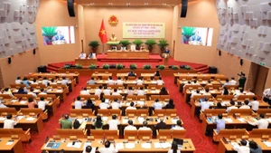 Quang cảnh kỳ họp thứ 24 của Hội đồng nhân dân thành phố Hà Nội khóa XVI, nhiệm kỳ 2021-2026.