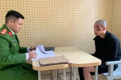 Đối tượng Nguyễn Anh Tuấn làm việc với cơ quan công an.