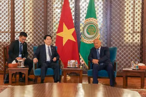 Chủ tịch nước Lương Cường gặp Tổng thư ký Liên đoàn Arab. (Ảnh: XUÂN KỲ)