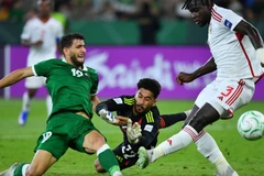 U23 UAE (áo trắng) giành quyền vào tứ kết gặp U23 Việt Nam. (Ảnh: AFC)