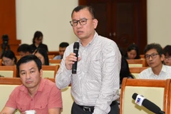 Ông Nguyễn Hoàng Dương - Phó Vụ trưởng Vụ Các định chế tài chính (Bộ Tài chính) tại buổi họp báo. 