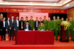 Quang cảnh lễ ký kết giữa Viện Khoa học hình sự và Trung tâm Mã số, mã vạch quốc gia.