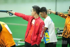 Xạ thủ Phạm Quang Huy cùng các đồng đội sẽ tranh tài ở nội dung 25m súng ngắn nhanh nam đồng đội. (Ảnh: HOÀNG MINH)