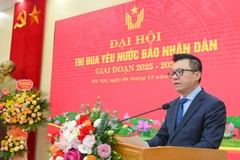 Đồng chí Lê Quốc Minh, Ủy viên Trung ương Đảng, Tổng Biên tập Báo Nhân Dân, Phó Trưởng Ban Tuyên giáo và Dân vận Trung ương, Chủ tịch Hội Nhà báo Việt Nam phát biểu tại đại hội. (Ảnh: THẾ ĐẠI)