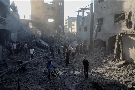 Cảnh tàn phá sau cuộc không kích của Israel tại Gaza. (Ảnh: THX/TTXVN)