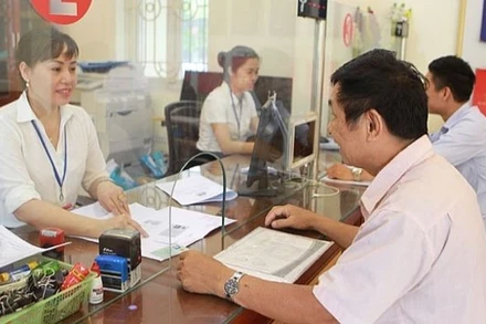 Việc thành lập Trung tâm phục vụ hành chính công giúp Hà Nội giảm mạnh số lượng công chức, viên chức tại bộ phận "một cửa". (Ảnh: MINH THU)