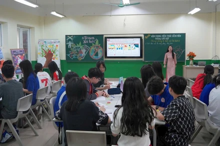 Tiết học môn Giáo dục Kinh tế và Pháp luật tại Trường THCS-THPT Lê Quý Đôn, phường Từ Liêm, Hà Nội. (Ảnh THẾ ĐẠI)