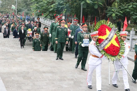 Lễ truy điệu và an táng hài cốt liệt sĩ tại Nghĩa trang Liệt sĩ Vị Xuyên.