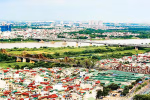 Quy hoạch tổng thể Thủ đô Hà Nội tầm nhìn 100 năm vừa được phê duyệt là cơ sở pháp lý quan trọng để triển khai Dự án Trục Đại lộ cảnh quan sông Hồng (Ảnh DUY LINH)