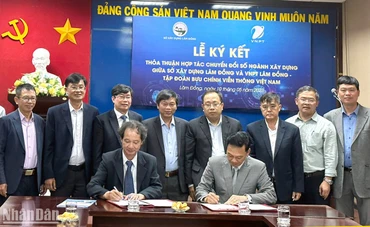 Quang cảnh lễ ký kết thỏa thuận hợp tác.