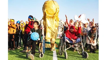 Trẻ em tại Idlib trong lễ khai mạc World Cup. Ảnh: AFP