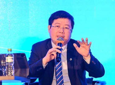 Ông Nguyễn Thanh Lâm, Thứ trưởng Bộ Thông tin và Truyền thông trao đổi tại hội thảo.