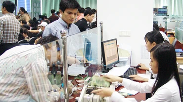 Nhiều công ty chứng khoán đã có kế hoạch tăng vốn, đáp ứng yêu cầu việc nâng cấp thị trường. Ảnh: NAM ANH