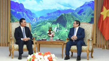 Thủ tướng Phạm Minh Chính và đồng chí Phet Phomphiphak, Bộ trưởng Bộ Kế hoạch và Đầu tư Lào, Chủ tịch Ủy ban hợp tác Lào-Việt Nam.
