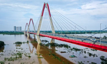 [Ảnh] Mực nước sông Hồng giảm, vùng đào lớn nhất Thủ đô vẫn chìm trong biển nước