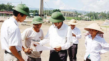 Luật Đất đai cần được sửa đổi để bảo đảm thống nhất, đồng bộ với các luật khác. Ảnh: NAM ANH