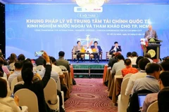 Quang cảnh hội thảo “Khung pháp lý về Trung tâm Tài chính quốc tế: Kinh nghiệm nước ngoài và tham khảo cho Thành phố Hồ Chí Minh”. (Ảnh: PLVN)