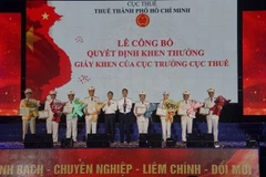 Cục Thuế khen thưởng các đơn vị thuộc Thuế Thành phố Hồ Chí Minh có thành tích xuất sắc trong công tác.
