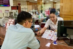 Thị trường trái phiếu doanh nghiệp chậm hồi phục, nguồn vốn cho kinh tế tư nhân vẫn phụ thuộc vào các ngân hàng.