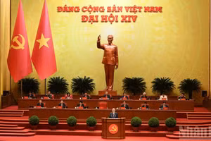 Tổng Bí thư Tô Lâm Báo cáo về các văn kiện trình Đại hội XIV Đảng Cộng sản Việt Nam tại phiên khai mạc Đại hội đại biểu toàn quốc lần thứ XIV Đảng Cộng sản Việt Nam. (Ảnh: TRẦN HẢI)