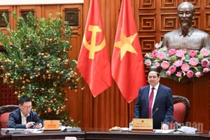 Thủ tướng Chính phủ Phạm Minh Chính chủ trì Phiên họp lần thứ 3 của Ban Chỉ đạo quốc gia về tài chính toàn diện. (Ảnh: TRẦN HẢI)