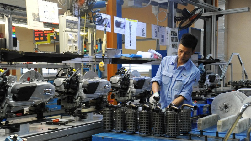 Dây chuyền sản xuất và lắp ráp xe máy ở Công ty TNHH Piaggio Việt Nam (Khu công nghiệp Bình Xuyên, tỉnh Vĩnh Phúc). (Ảnh: Trần Hải)