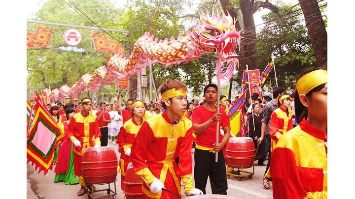 Cần dựa vào nhân dân để xây dựng hệ giá trị quốc gia gắn với xây dựng hệ giá trị văn hóa, hệ giá trị con người và hệ giá trị gia đình Việt Nam. (Ảnh: Quang Hưng)