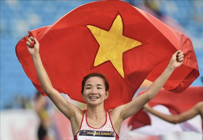 Nguyễn Thị Oanh giành Huy chương Vàng nội dung chạy 10.000m nữ. (Ảnh: TTXVN)
