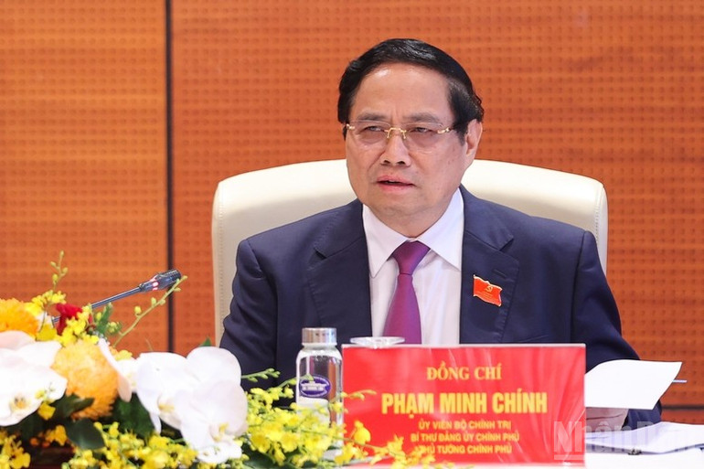 Thủ tướng Phạm Minh Chính phát biểu ý kiến tại tổ thảo luận số 1. (Ảnh: Trần Hải) ndo_br_thu-tuong-pham-minh-chinh-phat-bieu-y-kien-tai-to-thao-luan-so-1-anh-tran-hai.jpg