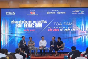 Các chuyên gia trao đổi tại sự kiện công bố báo cáo thị trường bất động sản quý I.