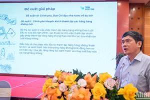 Ông Hoàng Nhân Chính, Trưởng Ban thư ký Hội đồng Tư vấn Du lịch (TAB) đề xuất 14 giải pháp giảm giá vé máy bay tại hội thảo. 