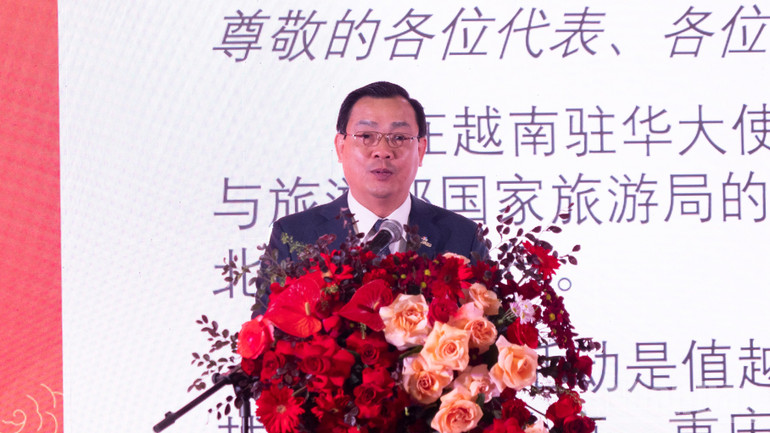 Director of Vietnam National Administration of Tourism Nguyen Trung Khanh delivered the opening speech. ndo_br_a02-p2416486-1.jpg