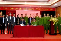 Quang cảnh lễ ký kết giữa Viện Khoa học hình sự và Trung tâm Mã số, mã vạch quốc gia.