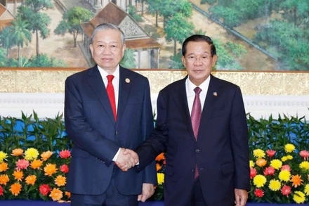 Tổng Bí thư Tô Lâm và Chủ tịch Đảng Nhân dân Campuchia Hun Sen. (Ảnh: TTXVN)