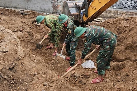 Đội quy tập 584 tìm kiếm hài cốt liệt sĩ tại Di tích Trường Bồ Đề.