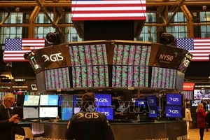Giao dịch viên tại Sàn chứng khoán New York, Mỹ. (Ảnh: THX/TTXVN)