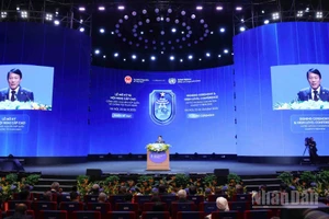 Bộ trưởng Công an Lương Tam Quang phát biểu bế mạc Lễ mở ký Công ước Hà Nội. (Ảnh: THỦY NGUYÊN)