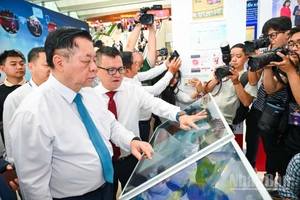 Các phóng viên báo chí tác nghiệp tại Hội báo toàn quốc 2025.