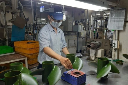 Hoạt động sản xuất Công ty TNHH Juki Việt Nam, Khu Chế xuất Tân Thuận, Thành phố Hồ Chí Minh.