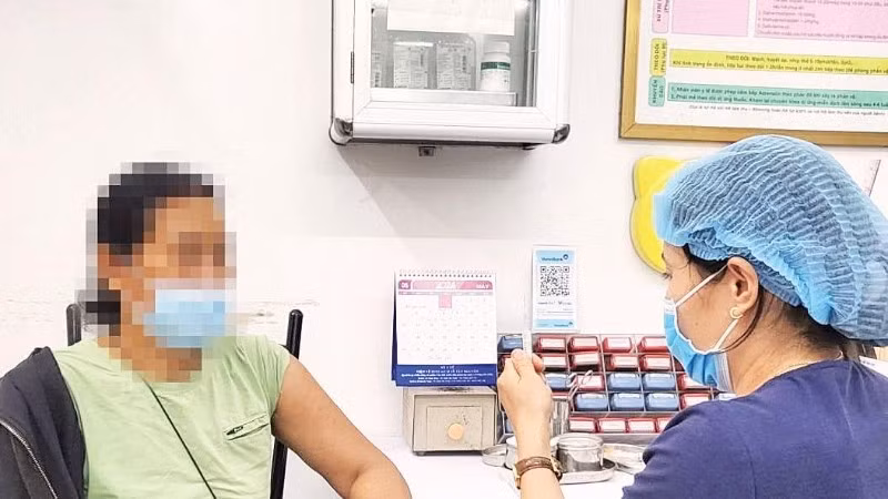 Cần đi tiêm chủng ngay sau khi bị chó, mèo cắn, cào để phòng bệnh dại (Ảnh QUANG NHẬT)