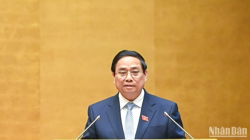 Thủ tướng Phạm Minh Chính trình bày Báo cáo của Chính phủ tại phiên khai mạc Kỳ họp. (Ảnh: DUY LINH)