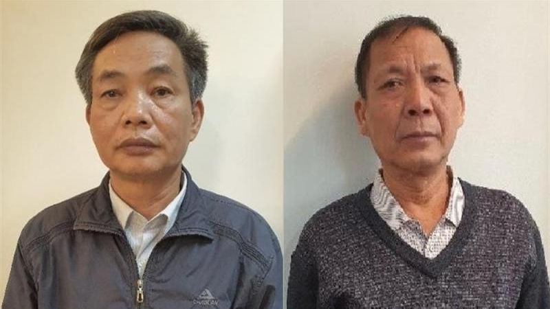 Bị can Đặng Ngọc Cầm (bên trái) và bị can Nguyễn Quốc Khánh (bên phải).